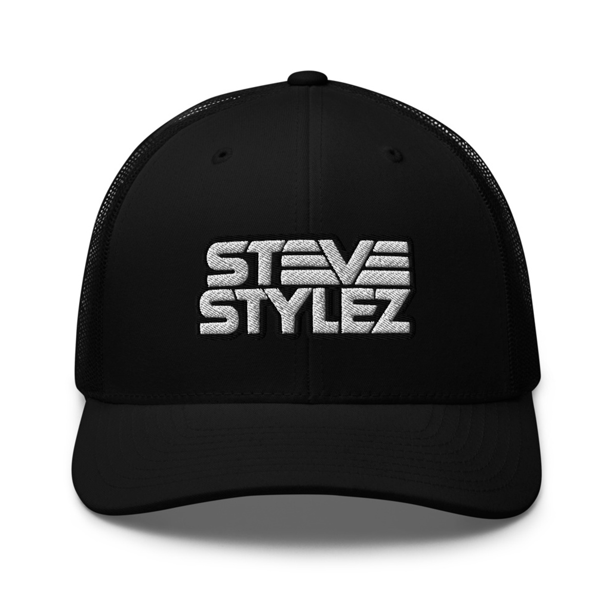 Steve Stylez trucker hat — front view, white embroidered logo on black